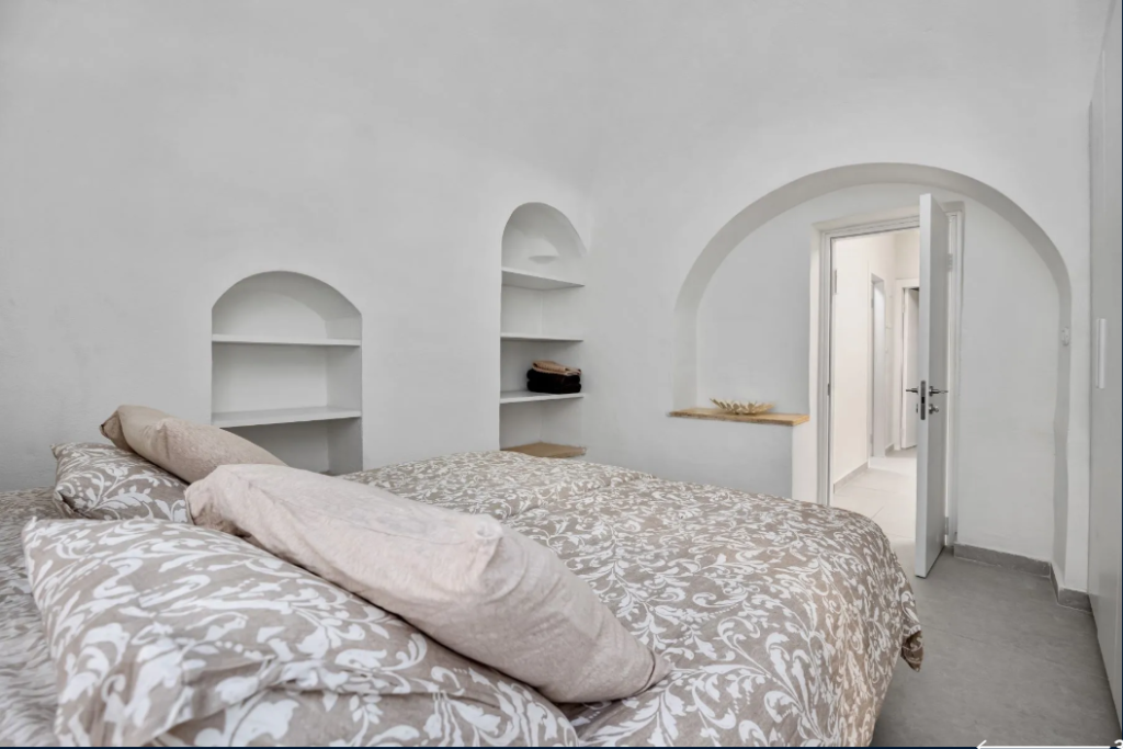 spacious bedroom old city jerusalem apartment built in shelves