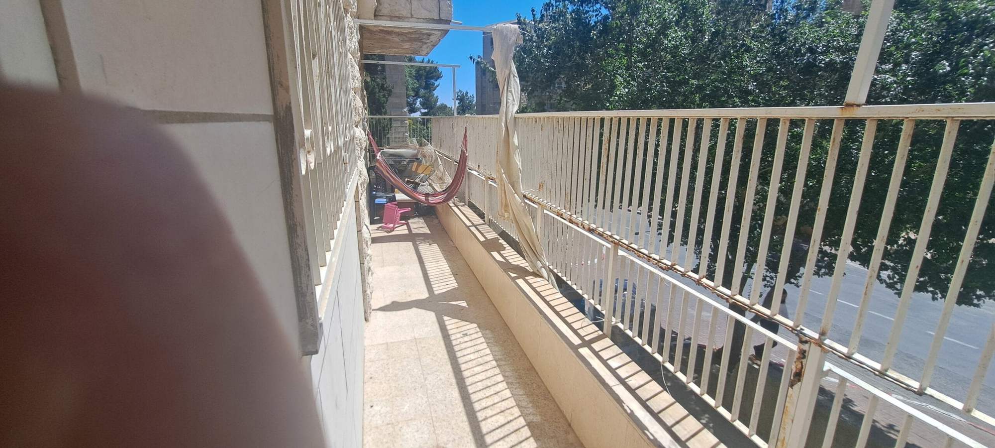 Garden and play area at the Hakalir Rechavia apartment