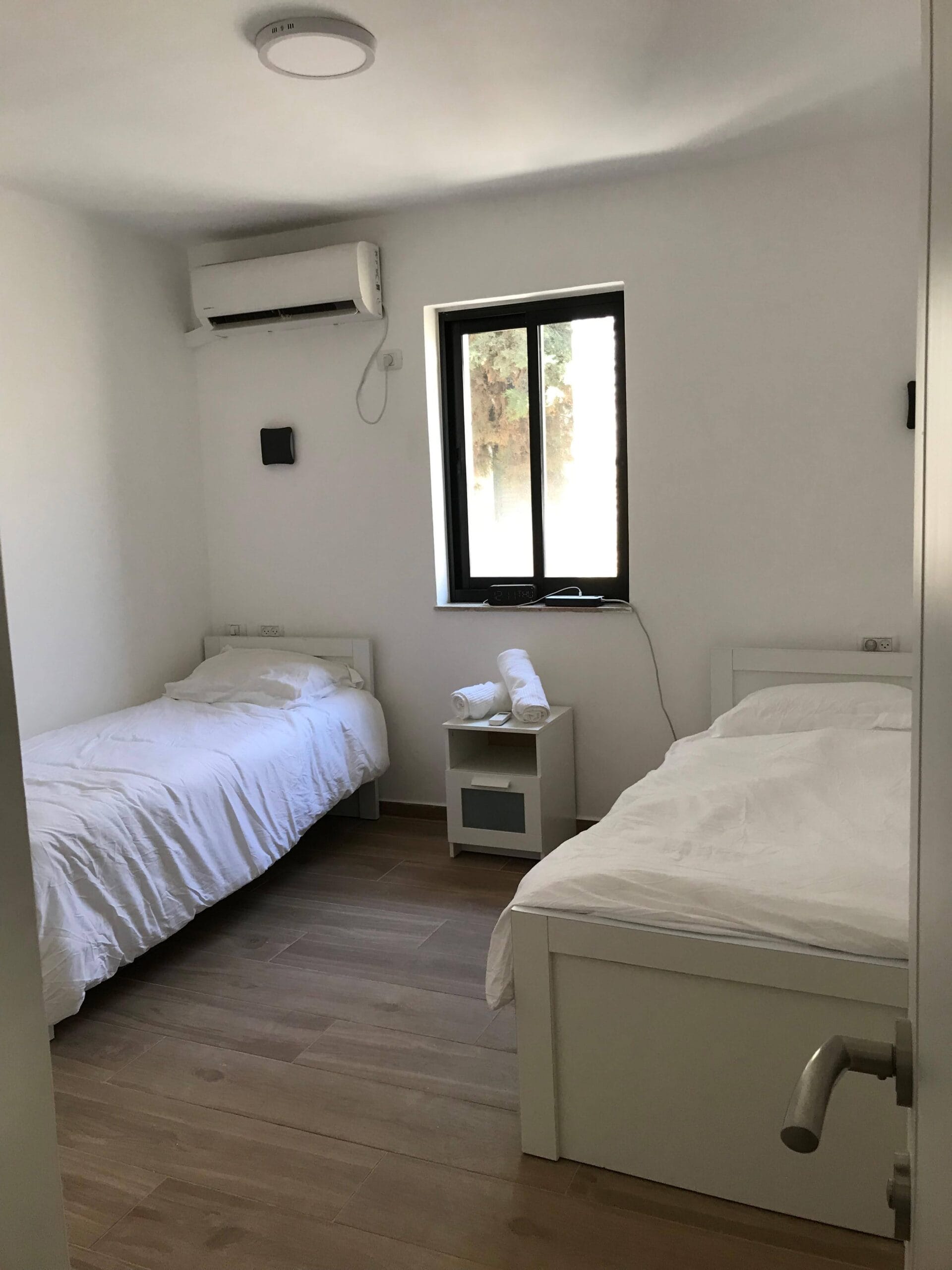 Comfortable bedroom with air conditioning