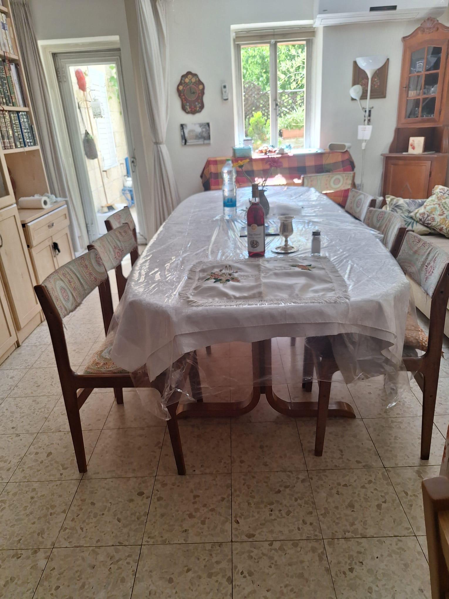 Dining room and living area in Old City family apartment