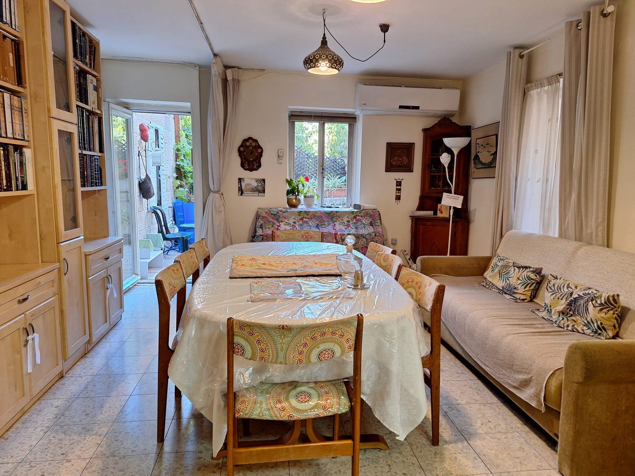 Bedroom with two beds in Old City family apartment near the Kotel