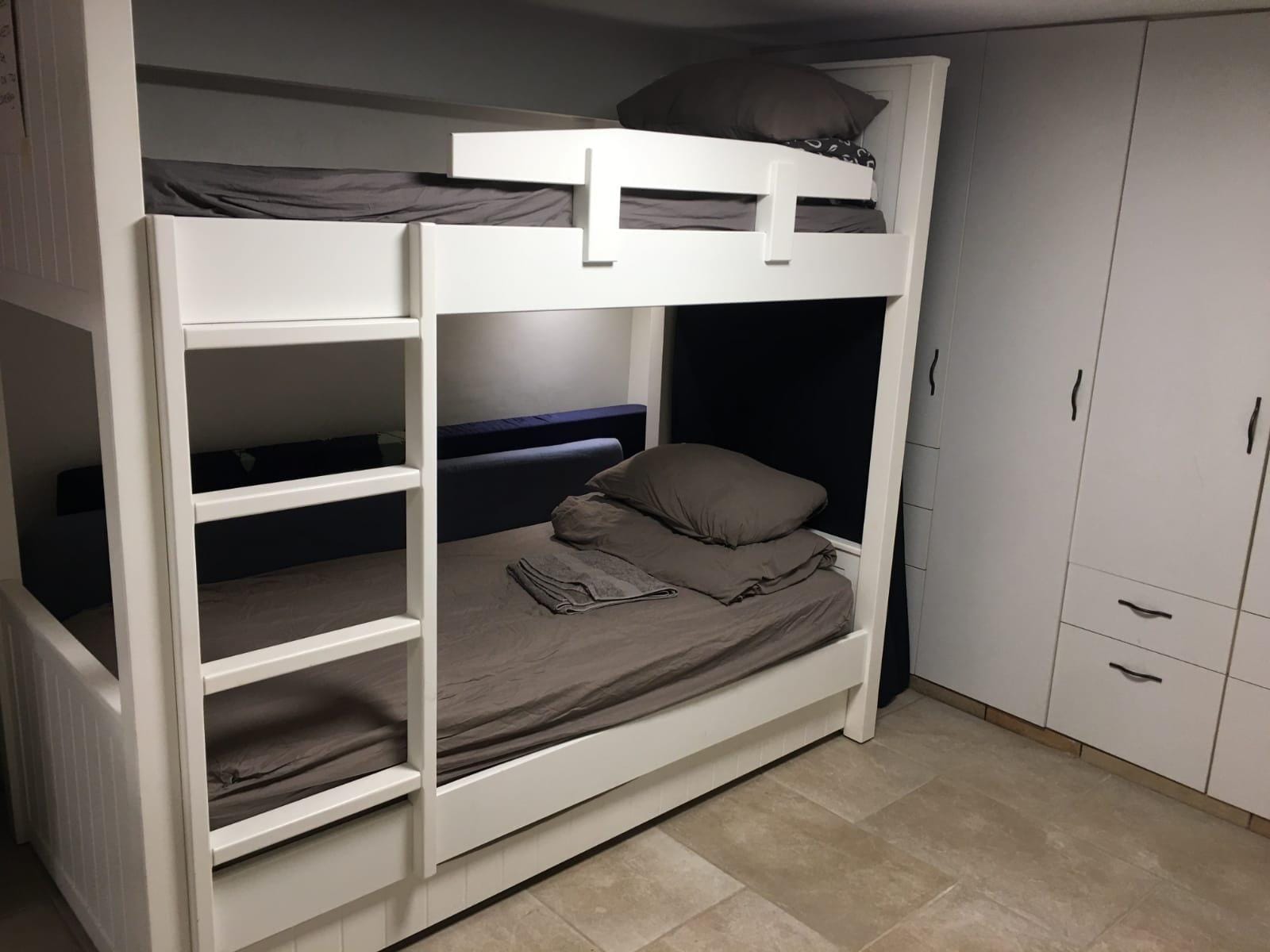 Bunk beds and storage in Old City Jerusalem apartment