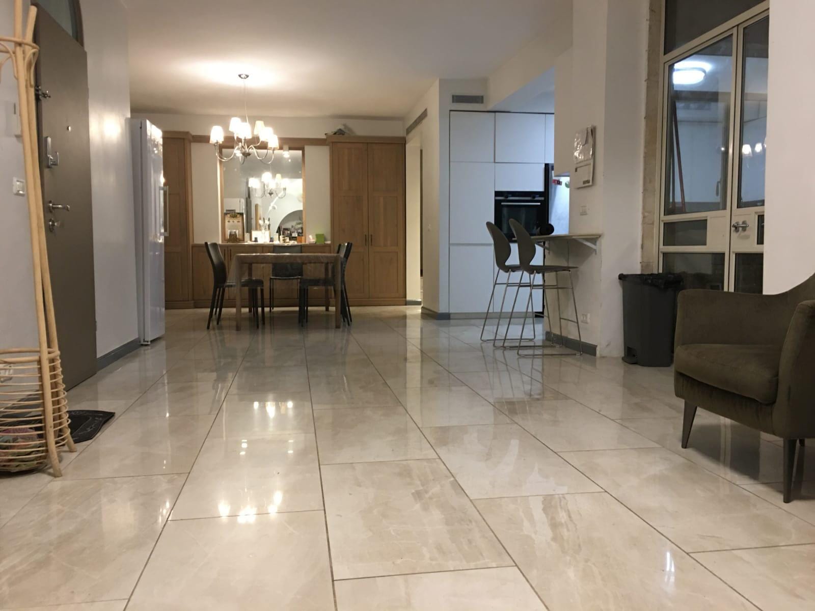 Large living and dining area in Old City apartment near the Kotel