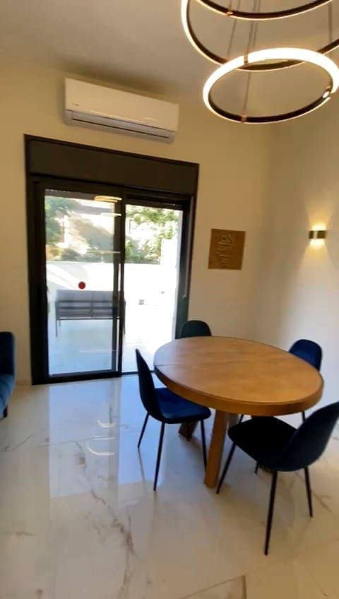 Dining area in the 2 bedroom KKL Shaarei Chessed vacation apartment