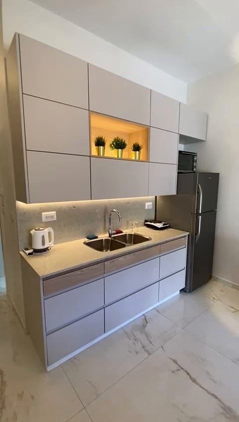 Modern kitchen in the 2 bedroom KKL Shaarei Chessed vacation rental