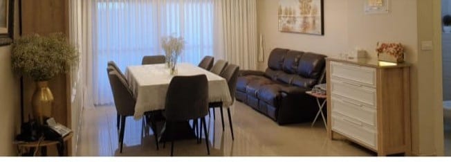 Living and dining area in the Hakalir Rechavia three-bedroom apartment