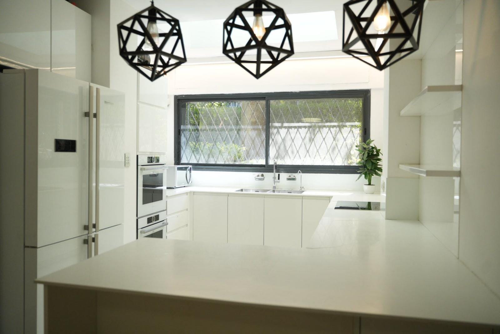 Modern kitchen in the Ben Maimon Rechavia two-bedroom apartment