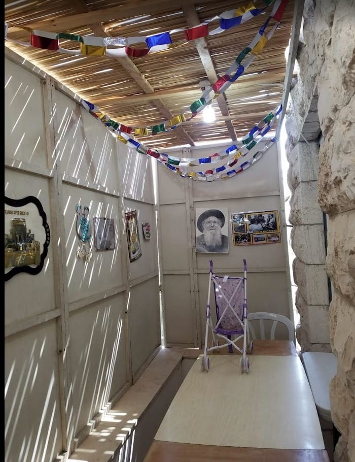 Interior of the four-bedroom Old City apartment with large sukkah