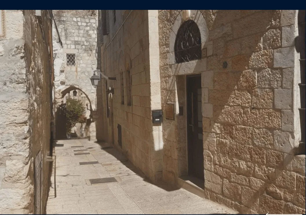 Historic stone exterior of a commercial / institutional building in the Old City’s Jewish Quarter
