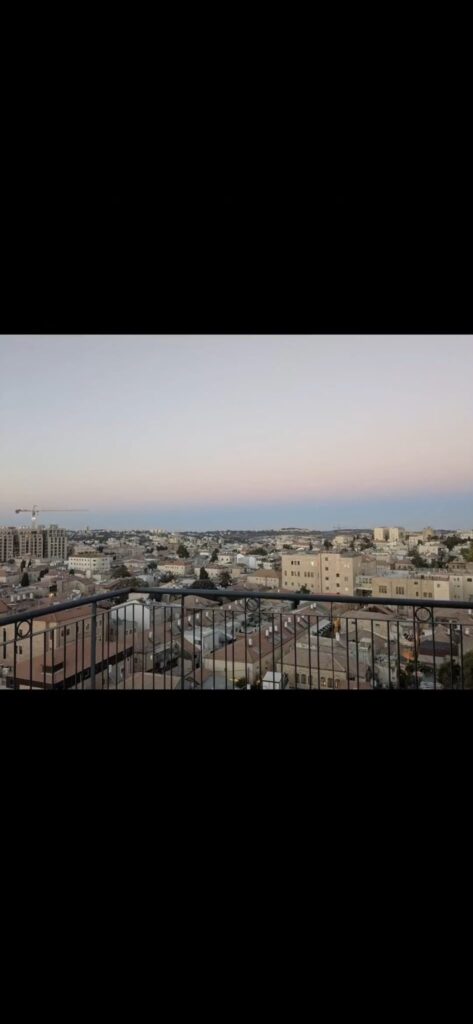 Open Jerusalem city views from the Navon apartment balcony in Mekor Baruch