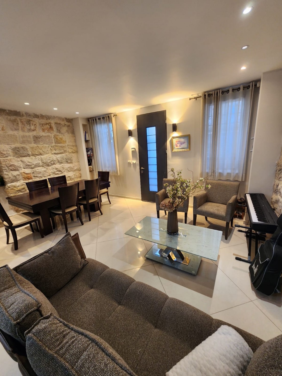 Modern living and dining room in the Diskin Street Succos apartment in Jerusalem