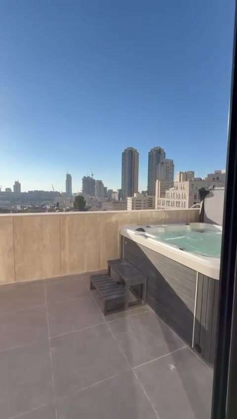 Private rooftop Jacuzzi overlooking Jerusalem at the Eliash Street penthouse