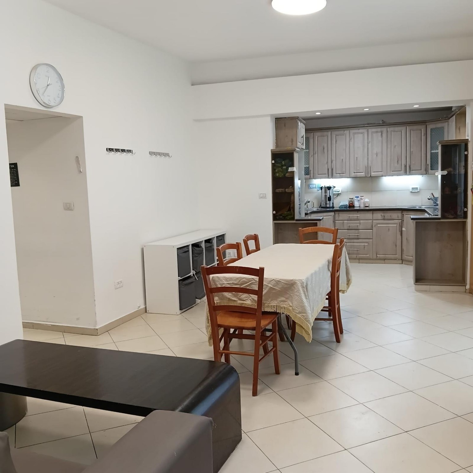 Dining area and kitchen at Ibn Shaprut Apartment #2